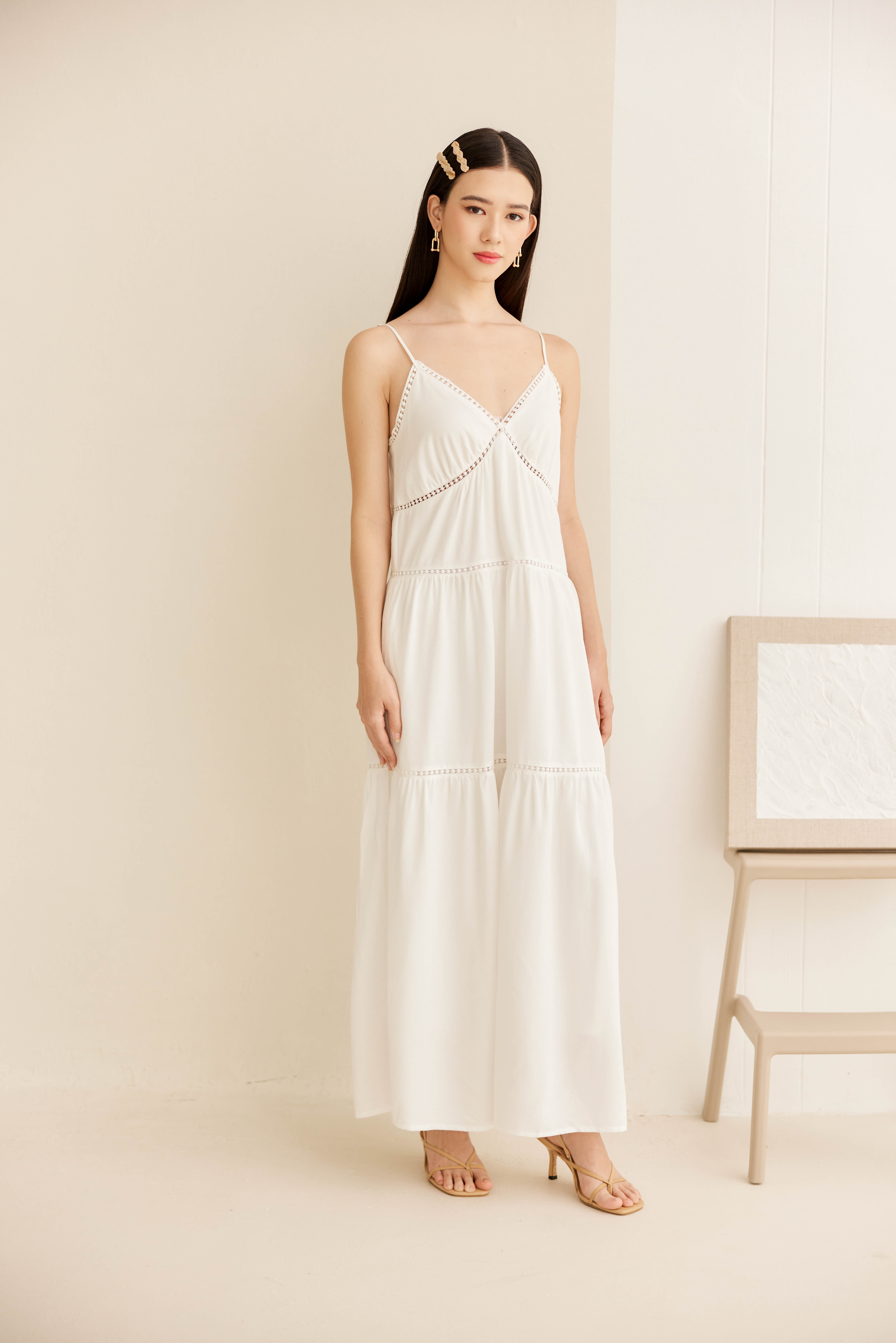 woman wearing a cozy white dress
