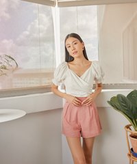Viola linen buckle shorts in rose pink colour outdoors