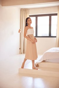bindi linen ruched cropped top in white with mallory belted midi skirt in nude