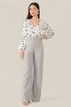 white floral smocked blouse and pale grey wide leg pants