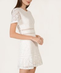 Model in Cirlene Open Back Women's Lace Dress in White online blogshop