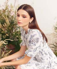 Model in HVV Atelier Sierra Floral Shirred Dress in Navy Online close up view