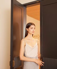 model side facing in theia cowl neck women's camisole top