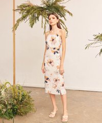 Model wearing Zonne Floral Gathered Women's Midi Dress in White
