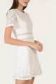 Model in Cirlene Open Back Women's Lace Dress in White online blogshop